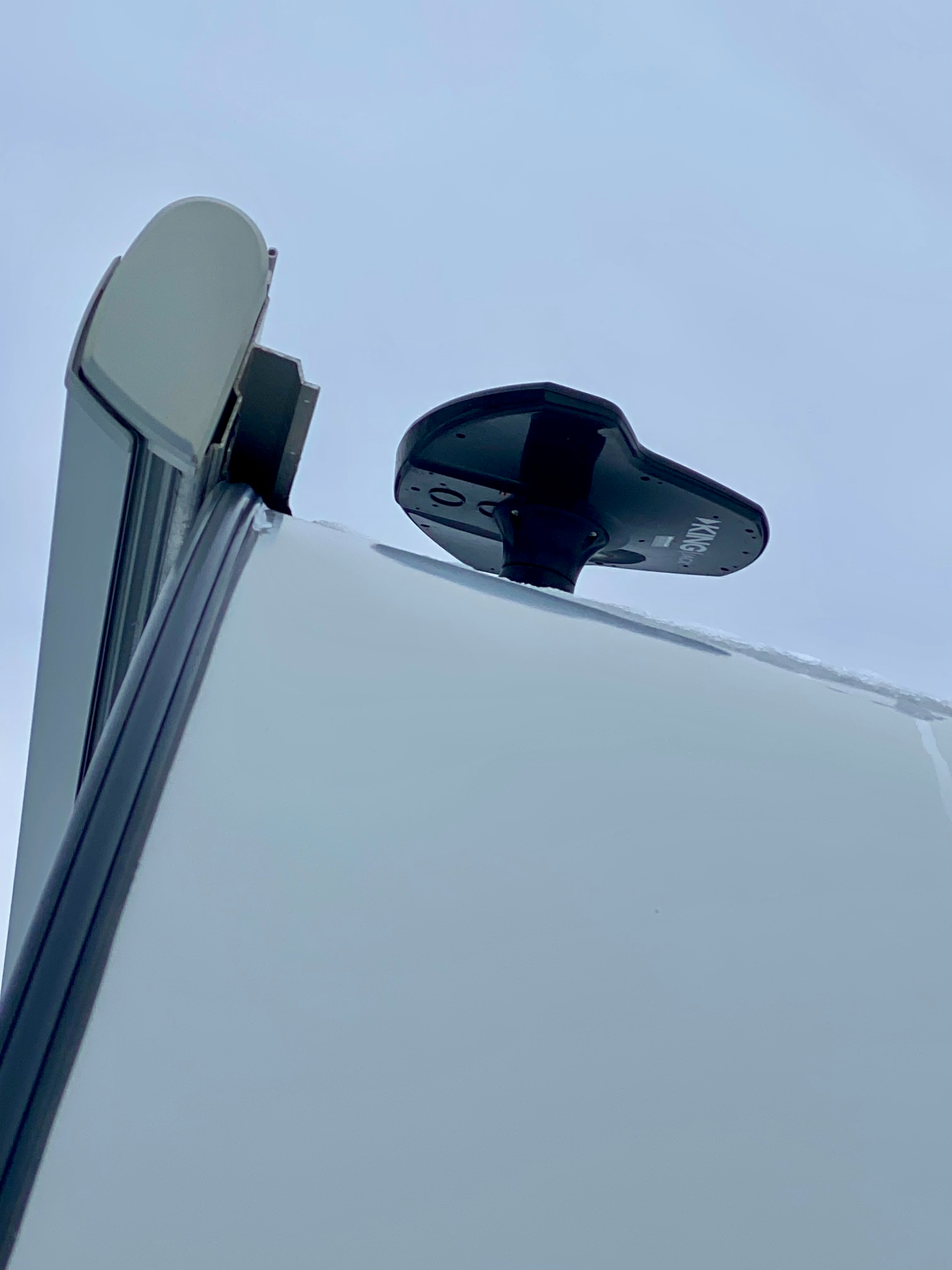 2018 Forest River R-Pod RP176 Travel Trailer showing awning and KING Jack Digital HDTV Antenna on the roof of trailer