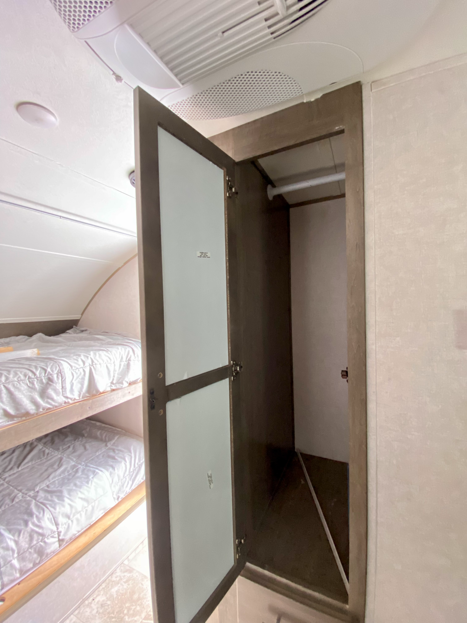 2018 Forest River R-Pod RP176 Travel Trailer showing interior clothes hanging closet and bunks