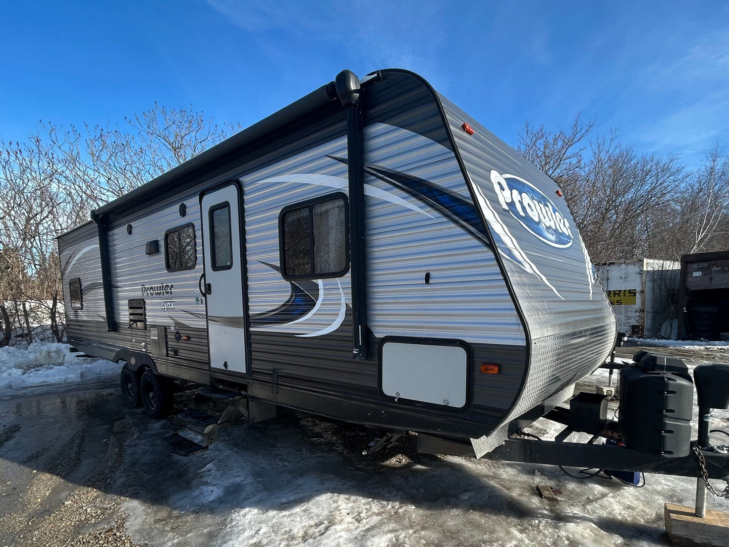 2018 Prowler Lynx  Travel Trailer showing entrance door and awning
